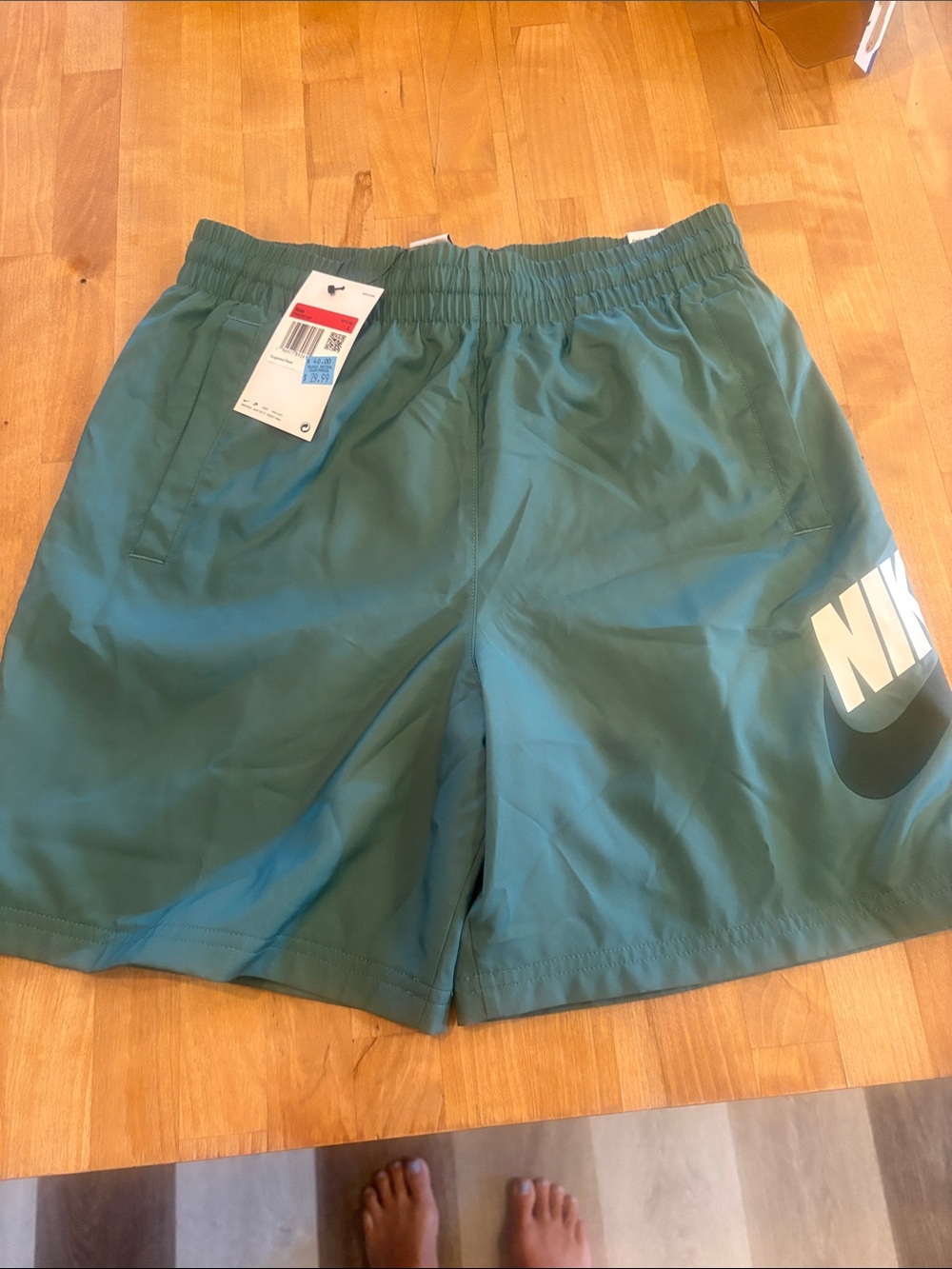 Nike Boys large Teal Green Athletic Shorts with Bold Logo